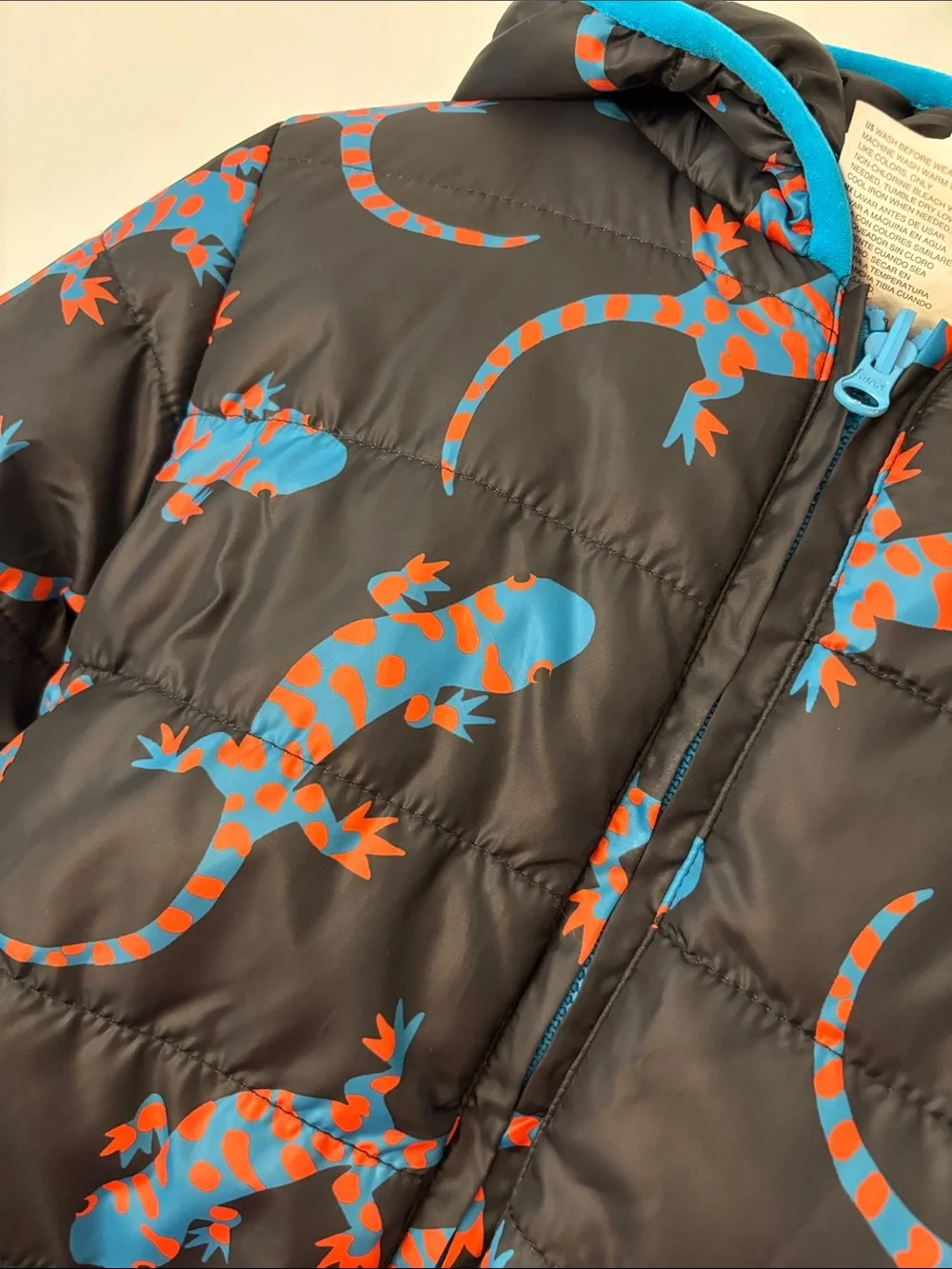 Epic Threads Black Puffer Jacket with Blue & Red Lizard Print